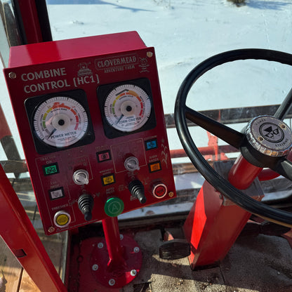 Harvest control console installed in combine cab